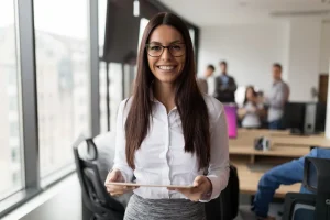 Professional In A Office Setup That Is Showcasing The Quality Assusrance Skills