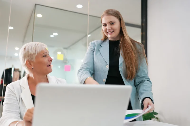 Administrative Assistant Showcasing Clerical Experience By Assisting Officemate