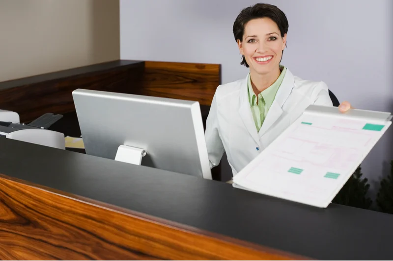 Clerk Handing Over Medical Records