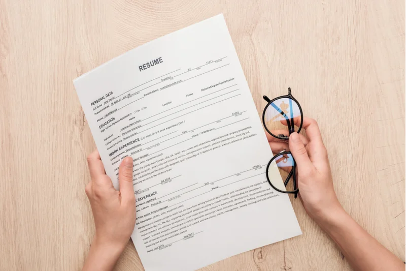 Job Seeker Reviewing How To List A Sabbatical On A Resume To Showcase Leadership And Learning Experiences