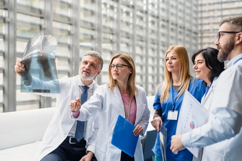 Medical Professionals Reviewing X-Ray Results Representing Best Paying Healthcare Careers