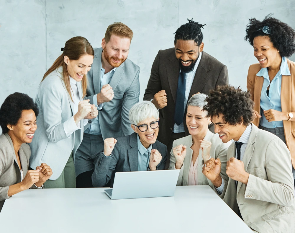 Team Members Discussing Professional Accomplishments And Career Success