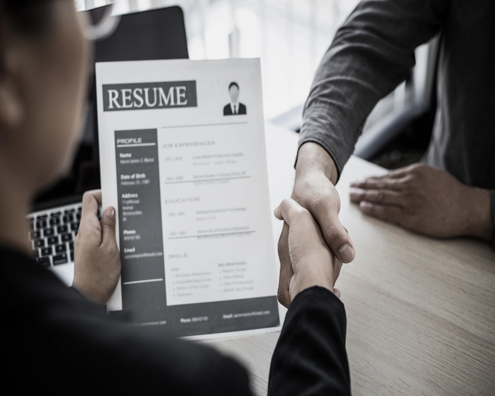 An Applicant With A Compelling Resume That Secures Job