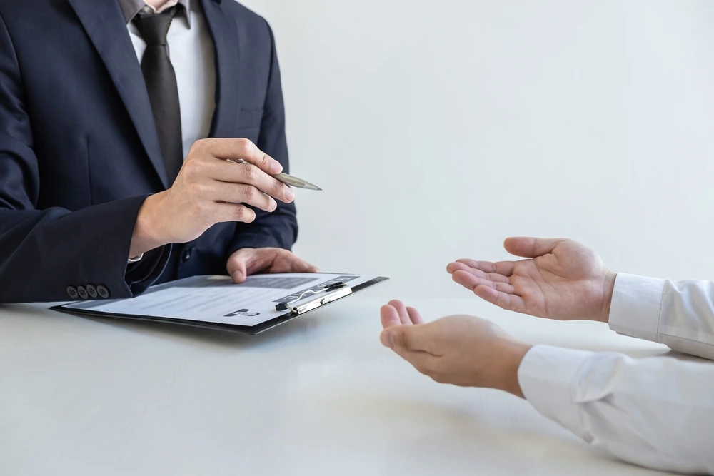 An Applicant Discussing Desired Compensation With Hiring Manager