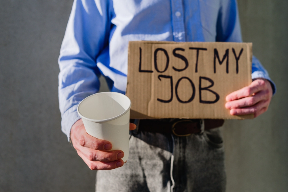 Man With Cardboard Sign Lost Job 2026 01 08 07 48 32 Utc 1