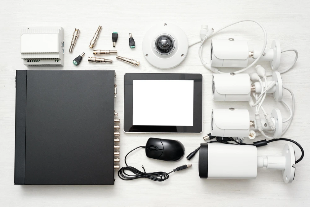 A Flat Lay Of Tools And Technologies Used By Security Personnel