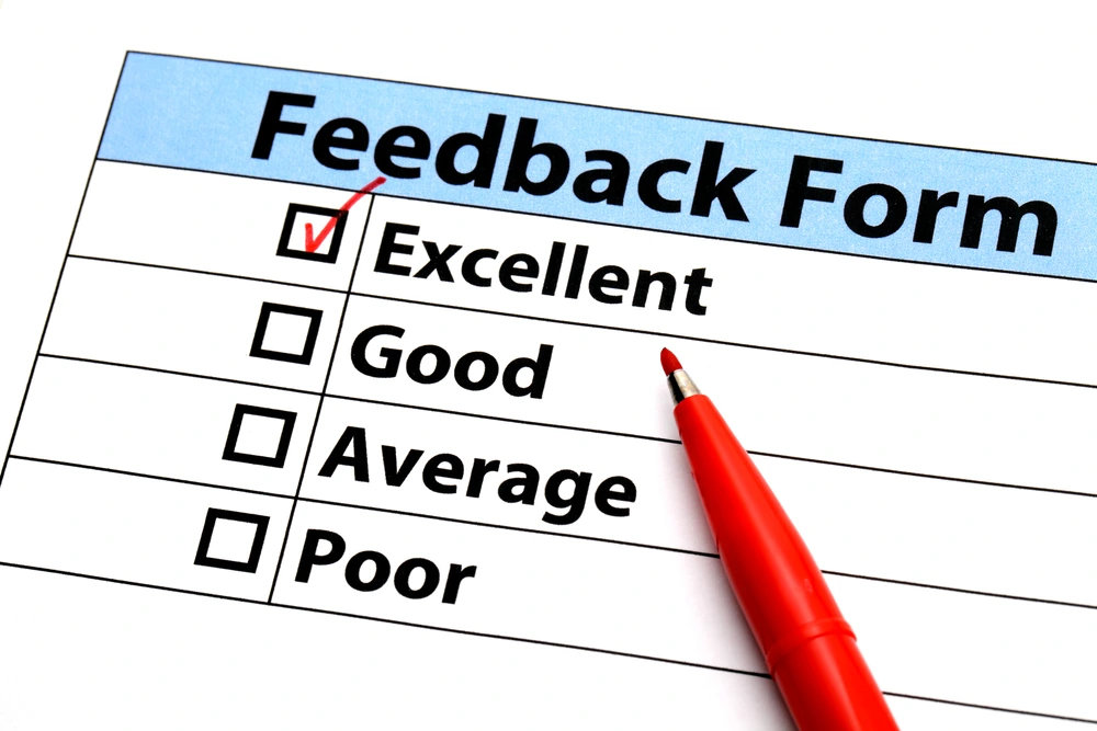 Customer Giving Feedback To A Service ProfessionalโWhat Does Customer Service Mean To You