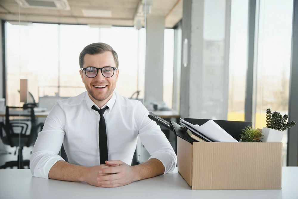 An Employee With A Radiant Smile Despite Termination