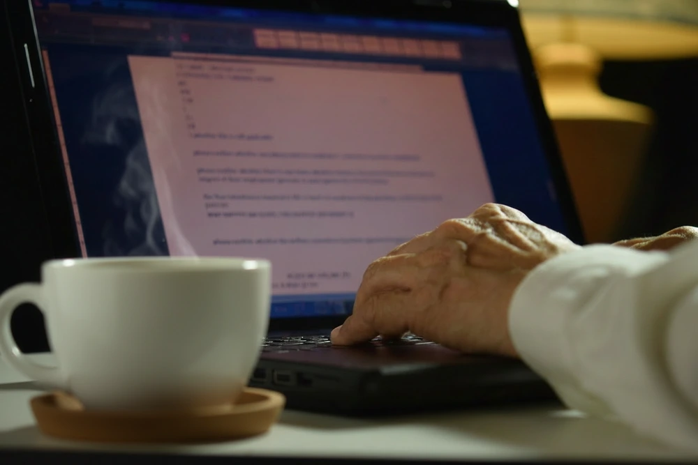 A Man Preparing A Cover Letter