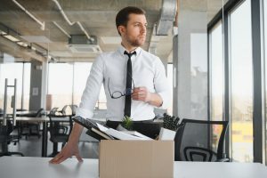 A Young Man Who Lost His Job And Packing His Stuff