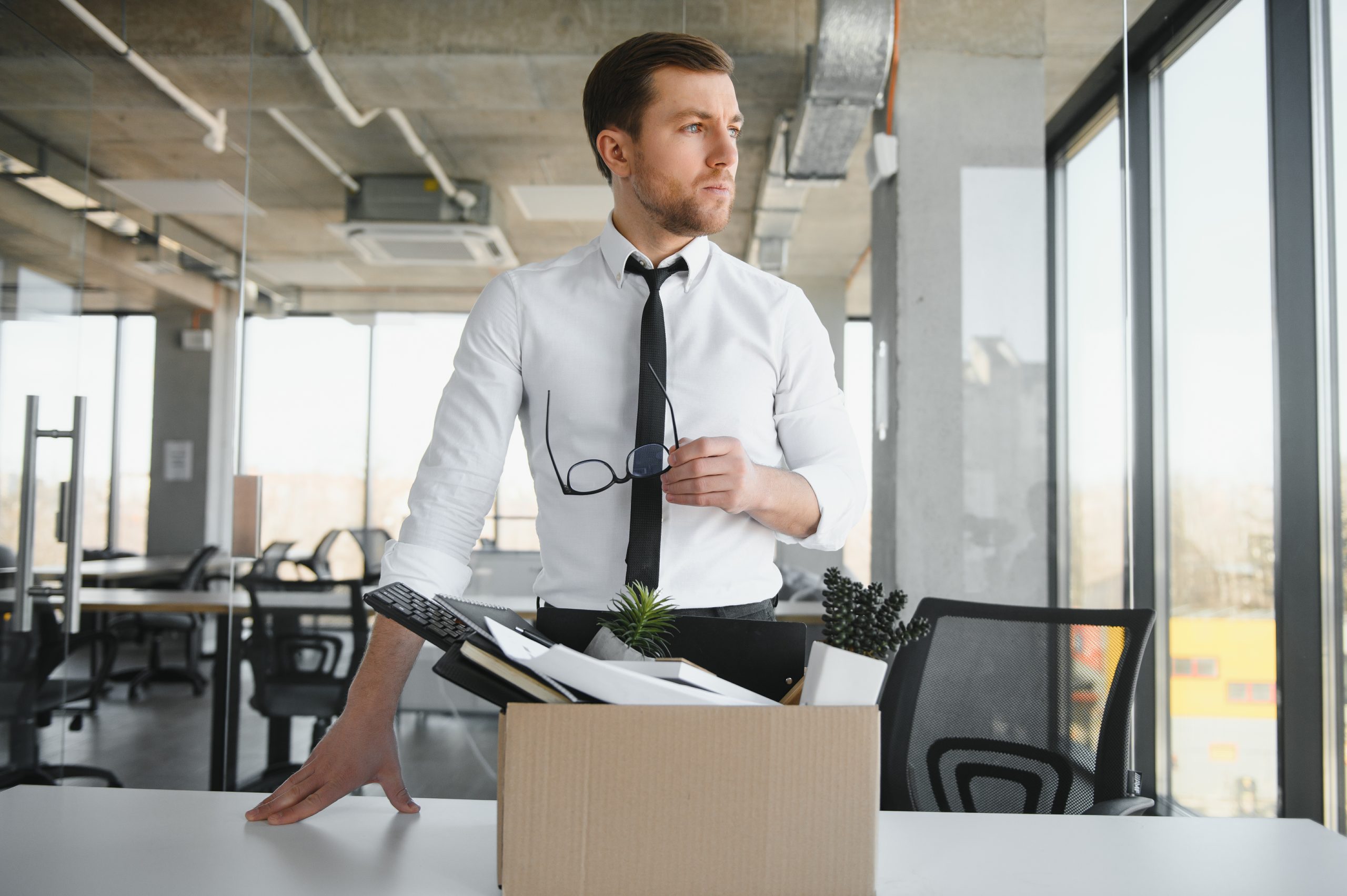 A Young Man Who Lost His Job And Packing His Stuff