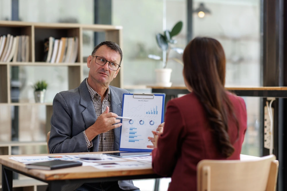 A Boss Showing Pip To His Employee
