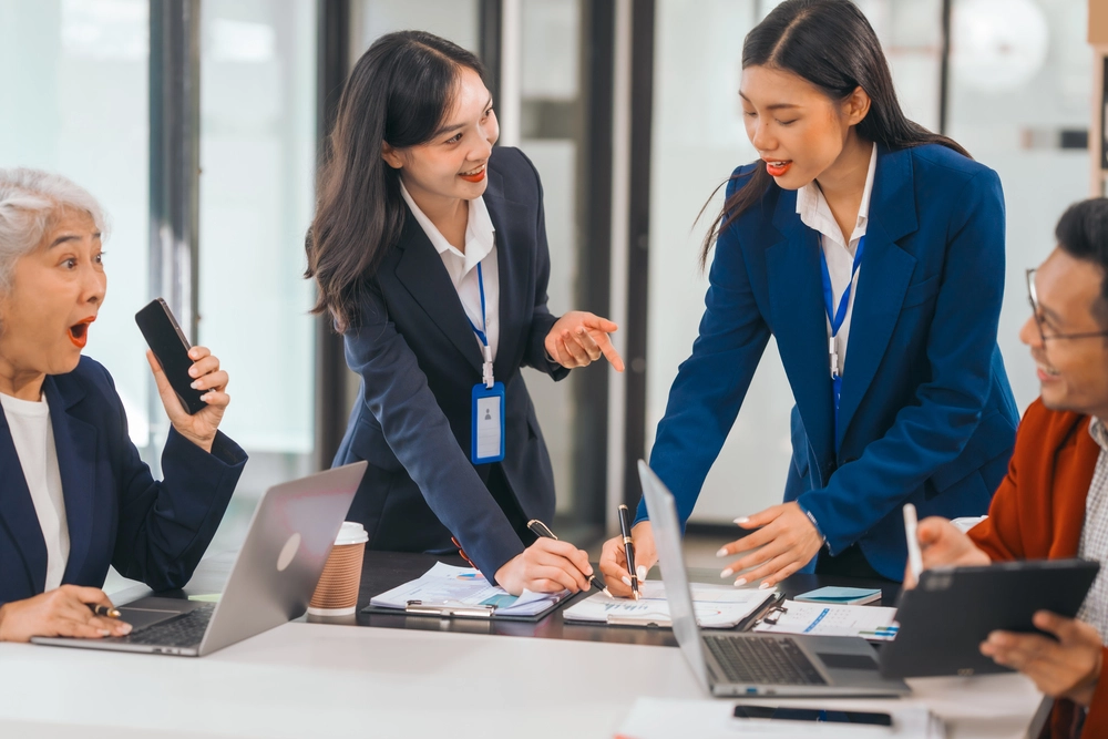 An Admin Staff Interacting With Executives, Clients, And Internal Staff.