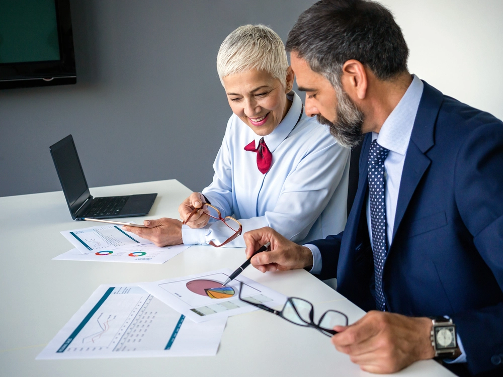 Operations Managers Analyzing And Managing Department Finance And Budget, Illustrating What Does An Operations Manager Do.