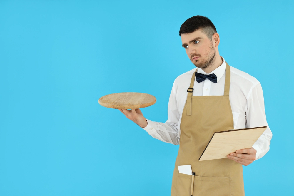 Concept Of Occupation Young Waiter On Blue Backgr 2026 03 24 23 07 59 Utc 1