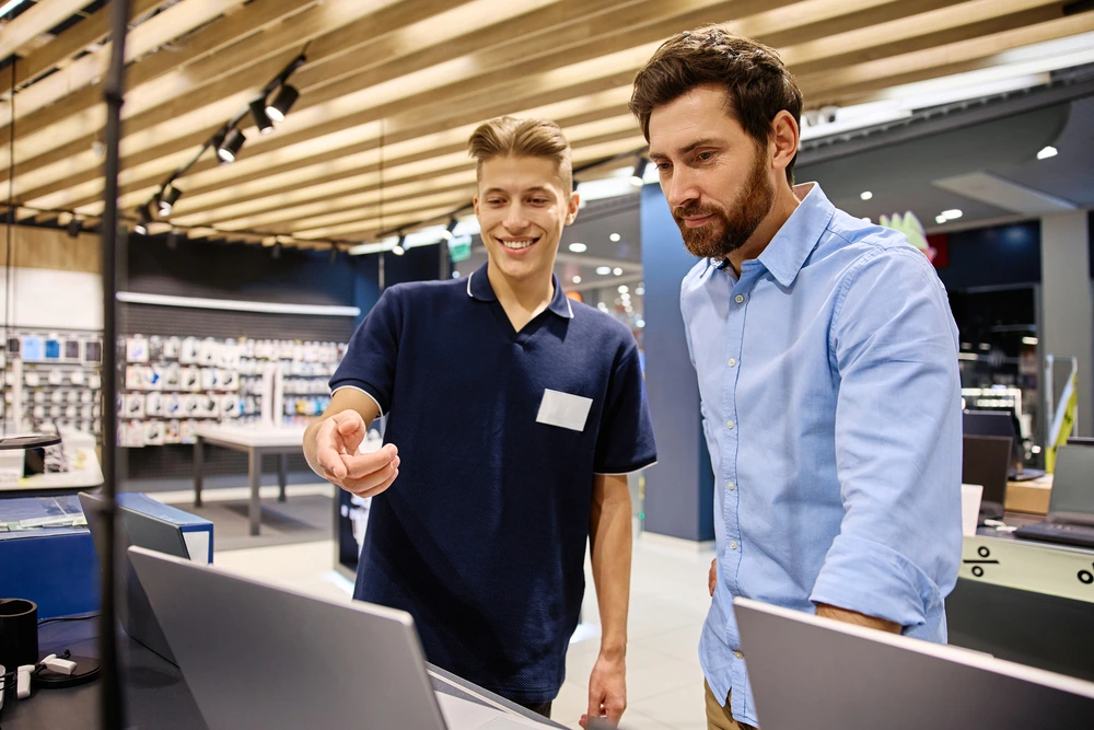 A Tech Support Providing Expert Advice To A Customer, Illustrating Great Customer Service.
