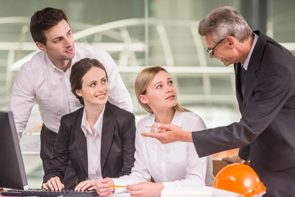 An Operations Manager Motivating And Mentoring Employees, Illustrating What Does An Operations Manager Do.