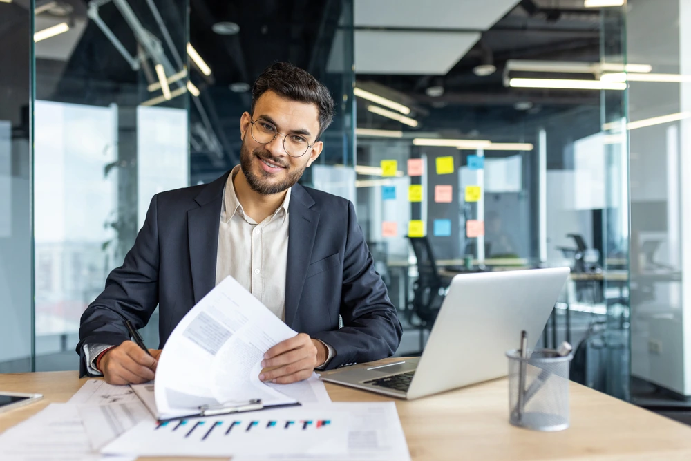 Portrait Of Successful Financier Man Signs Docume 2026 01 09 07 41 10 Utc 1