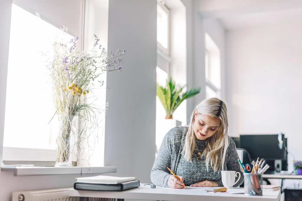 A Professional Writing A Heartfelt Farewell Message To Colleague.