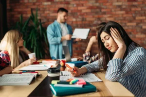 Passive Listening Shown By A Team Member, Illustrating Workplace Communication Challenges