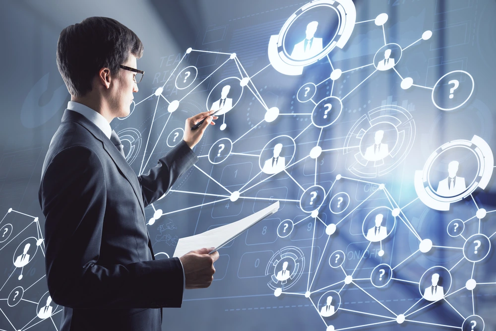 A Man Working With Digital Network And Analytics, Illustrating A Functional Organizational Structure In Modern Workplace.