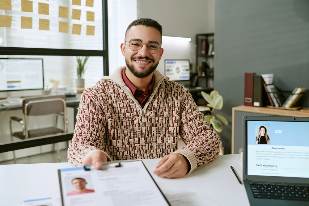 A Confident Job Applicant Submitting Resume For Jobs That Don't Require Background Checks.
