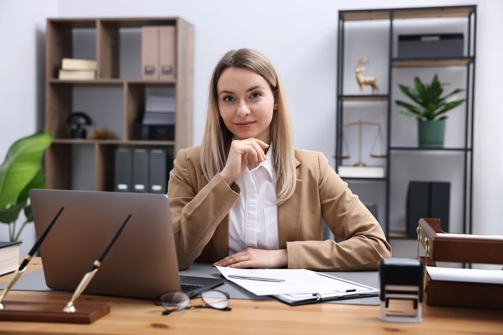 A Professional Resume Reviewer And Writer At Her Office.